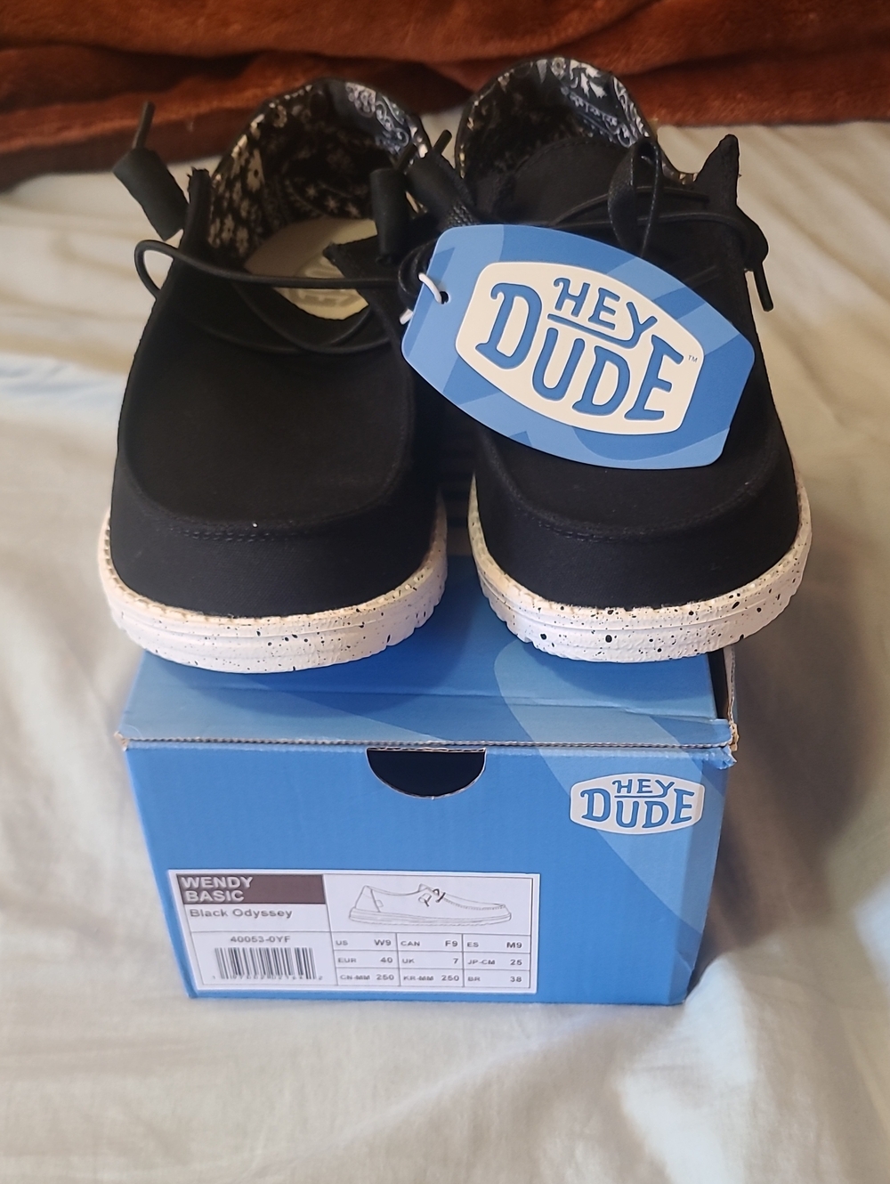 Hey Dude Women Wendy Basic Black Slip-On Sneakers with White Speckled Soles